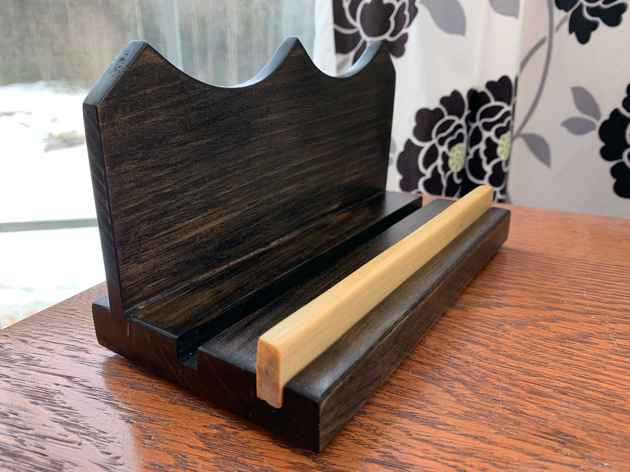 Cell phone stand with poly